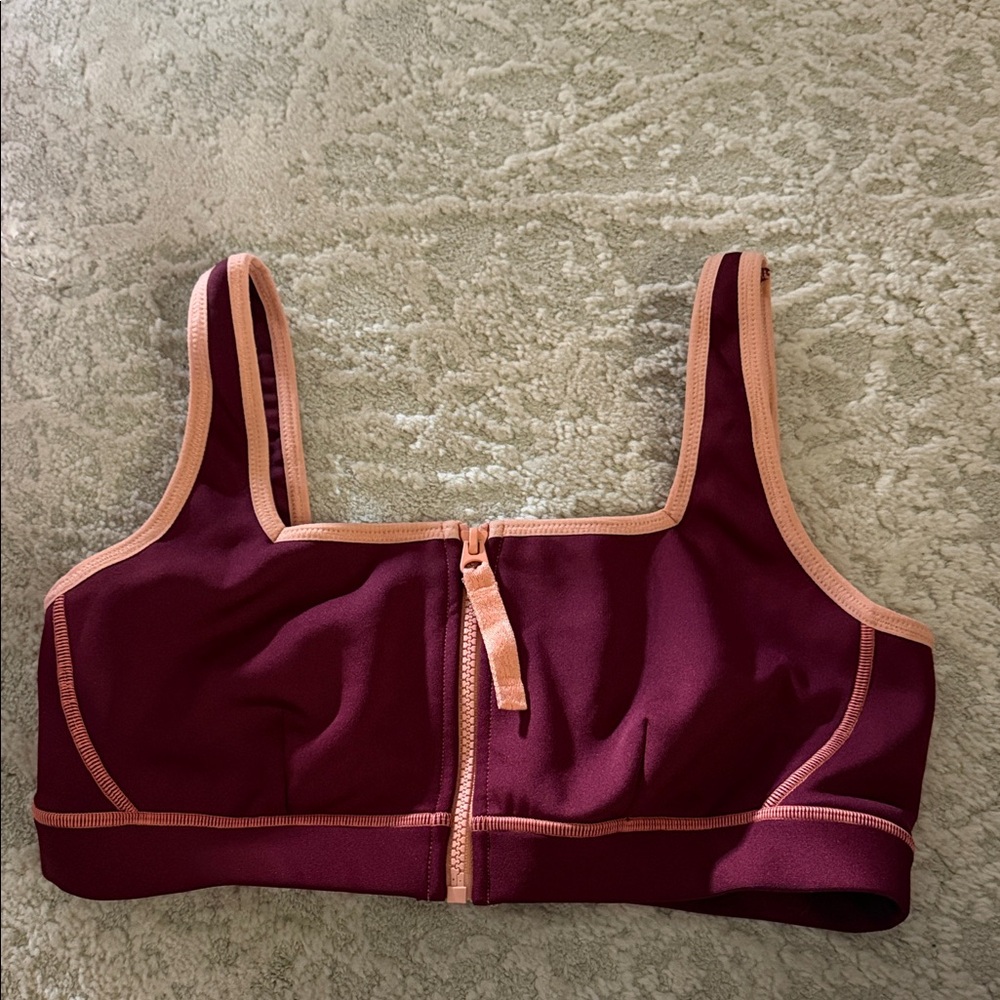 Fabletics  Front-Zip Sports Bra in Burgundy with Peach Trim